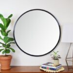 Round mirror with black frame - suitable anywhere in your house